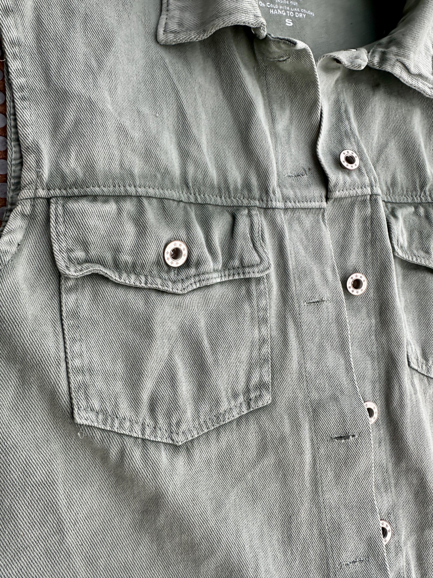 Boot stitch vest in sage green