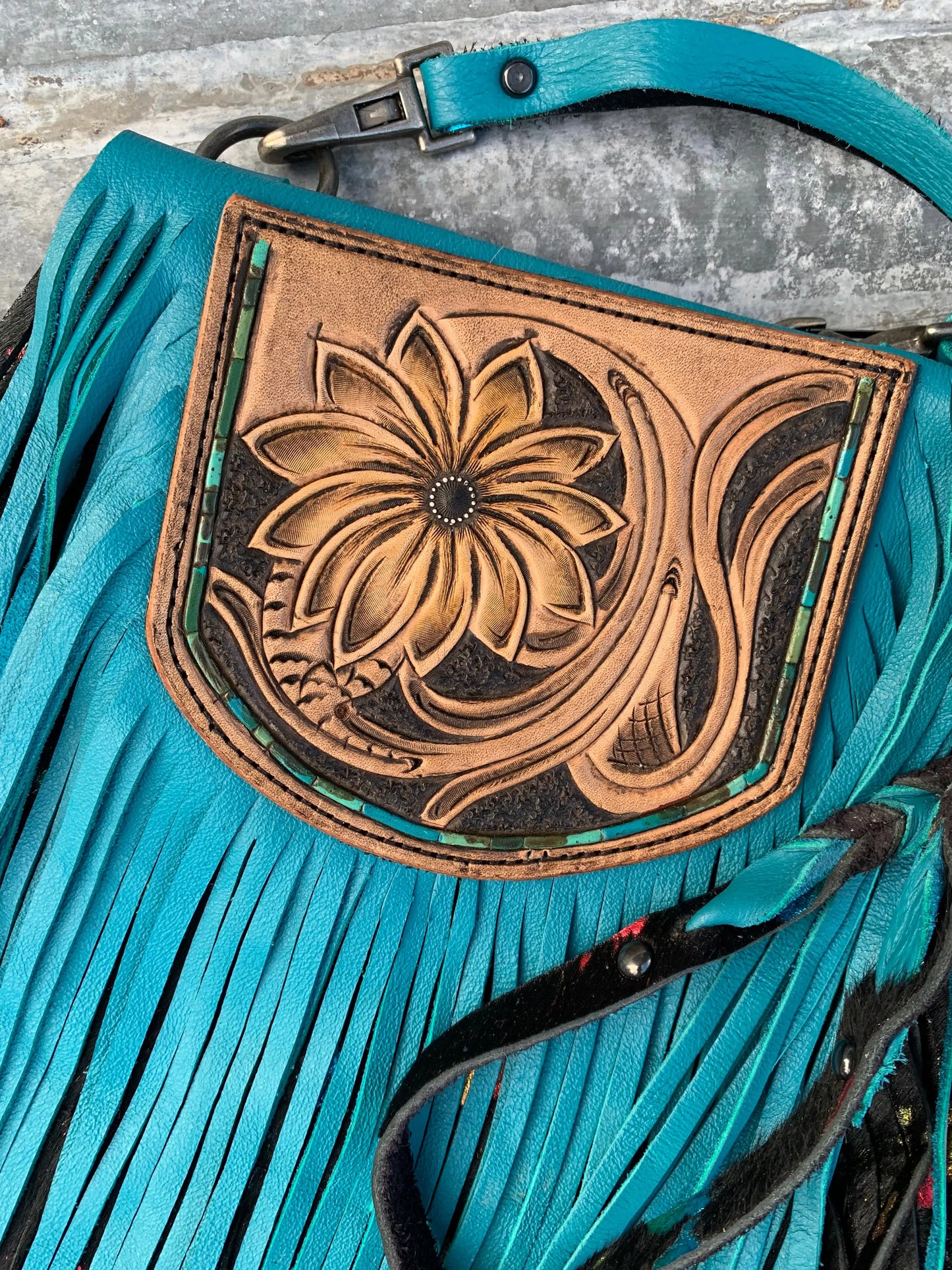 The Arena Leather Fringe Purse with Hand Tooled Sunflower and Confetti Avid Wash Hair on Hide The Rodeo Rose
