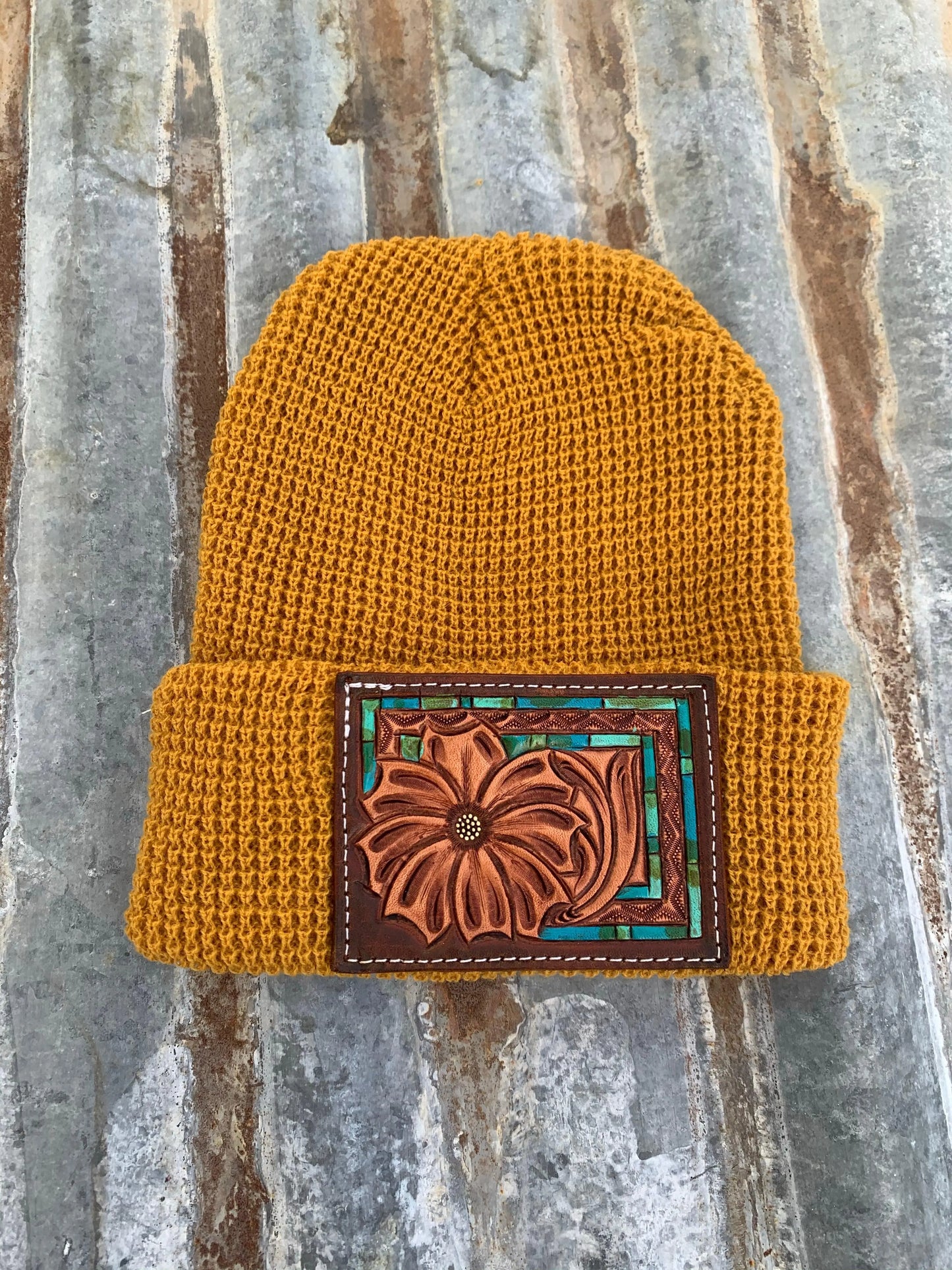 The Daisy Handtooled Leather Patch Beanie, Fitted in Turquoise and Southwest Border The Rodeo Rose