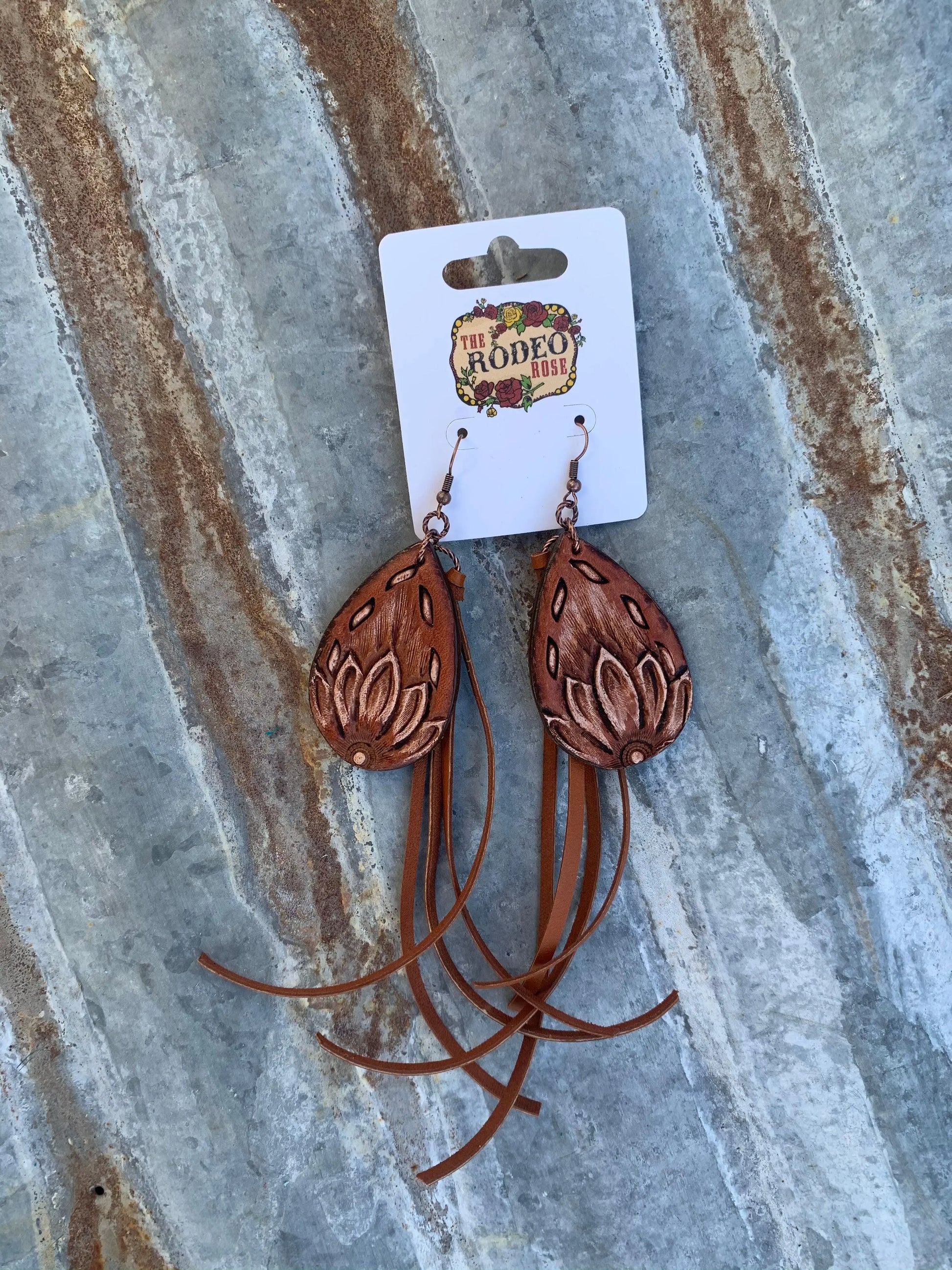The Tad Hand tooled Leather Earring with Buckstitch Border and Fringe The Rodeo Rose